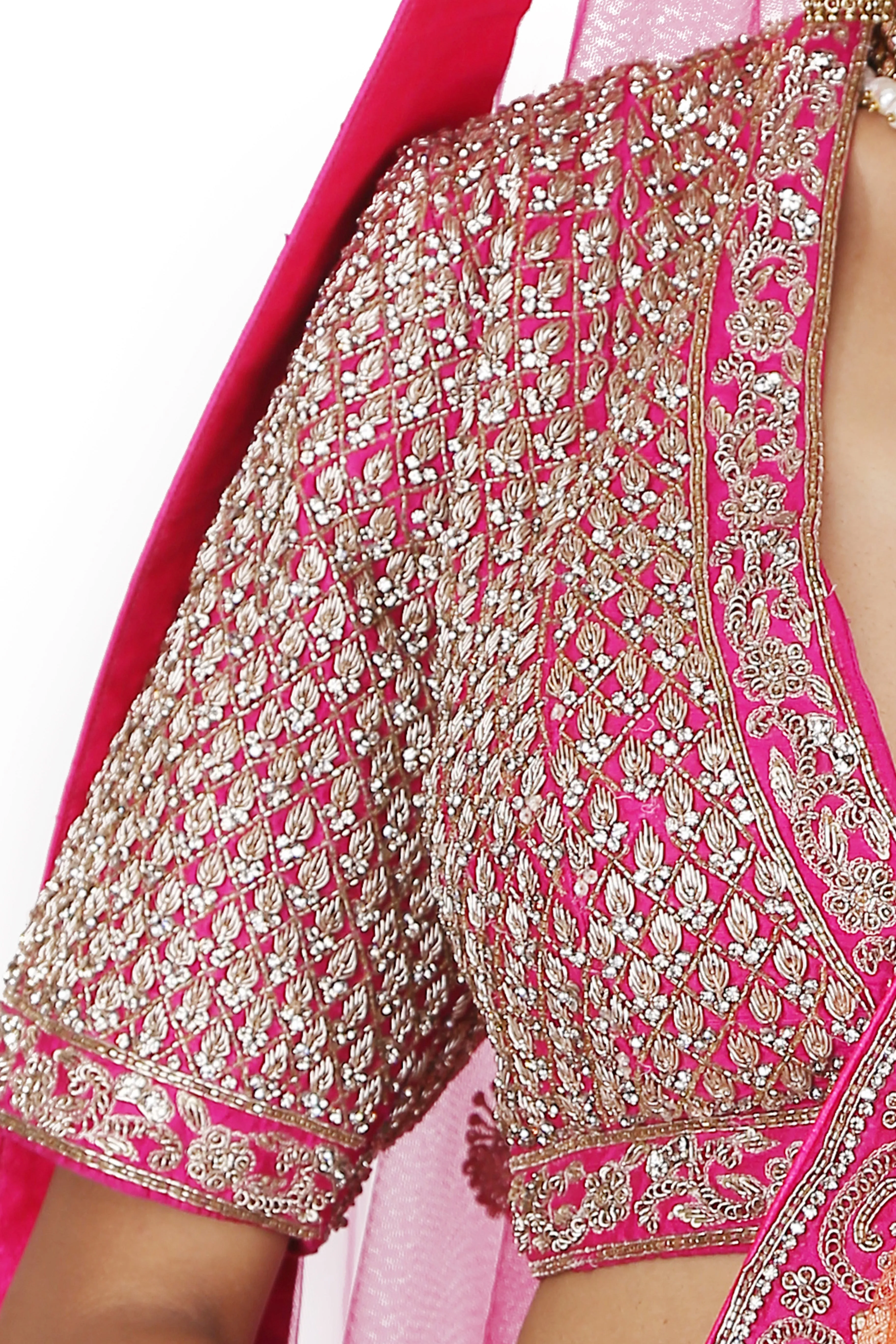 Magenta Embroidered Lehenga Set.