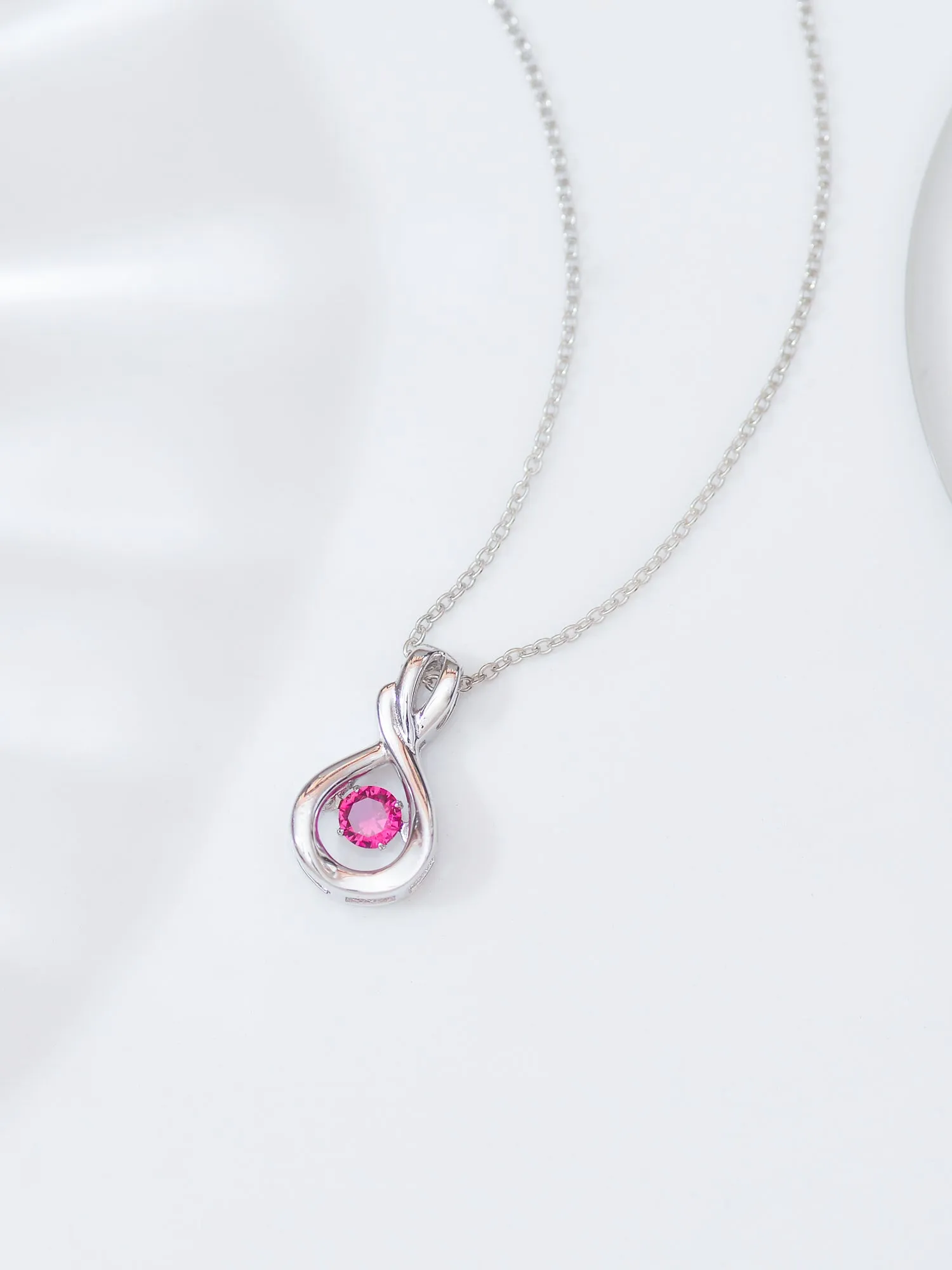 Ruby Infinity Design Dancing Pendant In 925 Silver